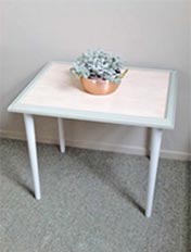 Use an wooden picture frame to create an occasional table