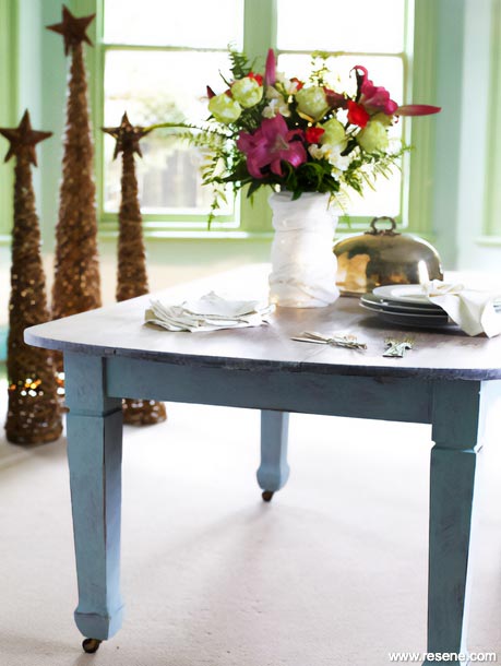 A refurbished table with a modern chalk paint effect