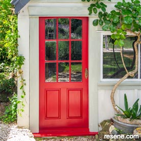 Painting a red door