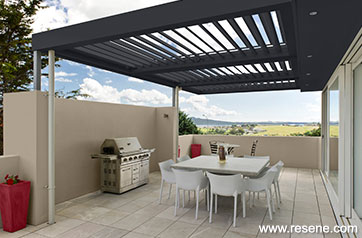 Cool colours with a hint of red pergola