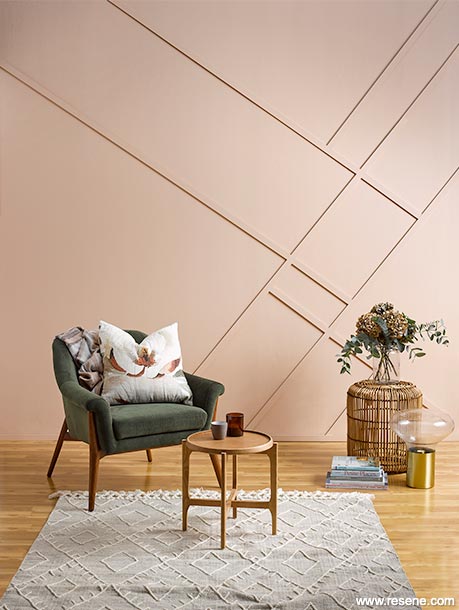 Wall panelling in rosy coloured paint