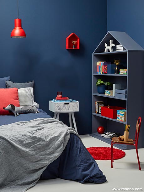 Blue bedroom with bookcase