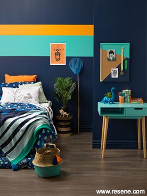 A kids room with bold painted shapes 