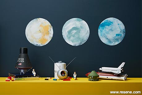 Painted moons in teen room