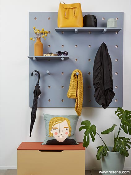 Entryway with pegboard for storage