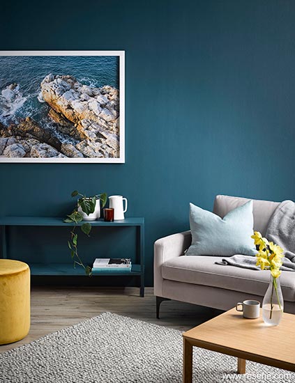 A creative and energising teal and yellow lounge