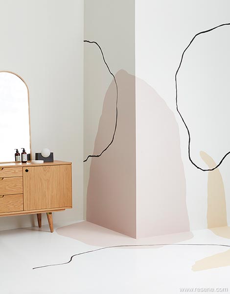An organic wall mural follows a relaxed freehand style