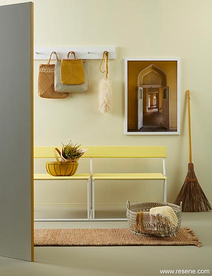 An understated entryway looks warm and inviting