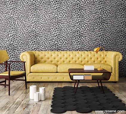 Leopard print wallpaper brings character to this wild lounge