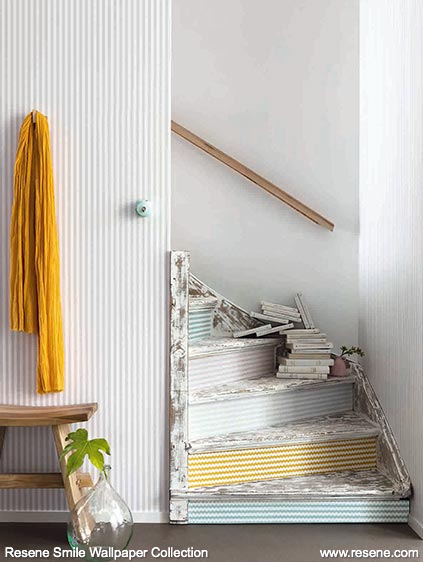 Four striped designs from the Resene Smile Wallpaper Collection add interest to this stairwell