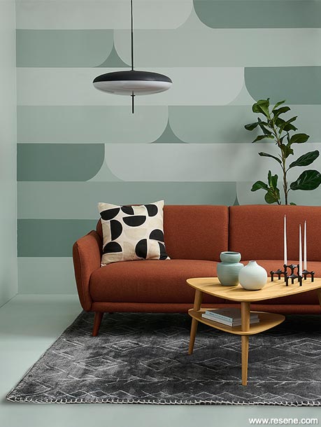 Green mid-century modern lounge with bold graphic designs