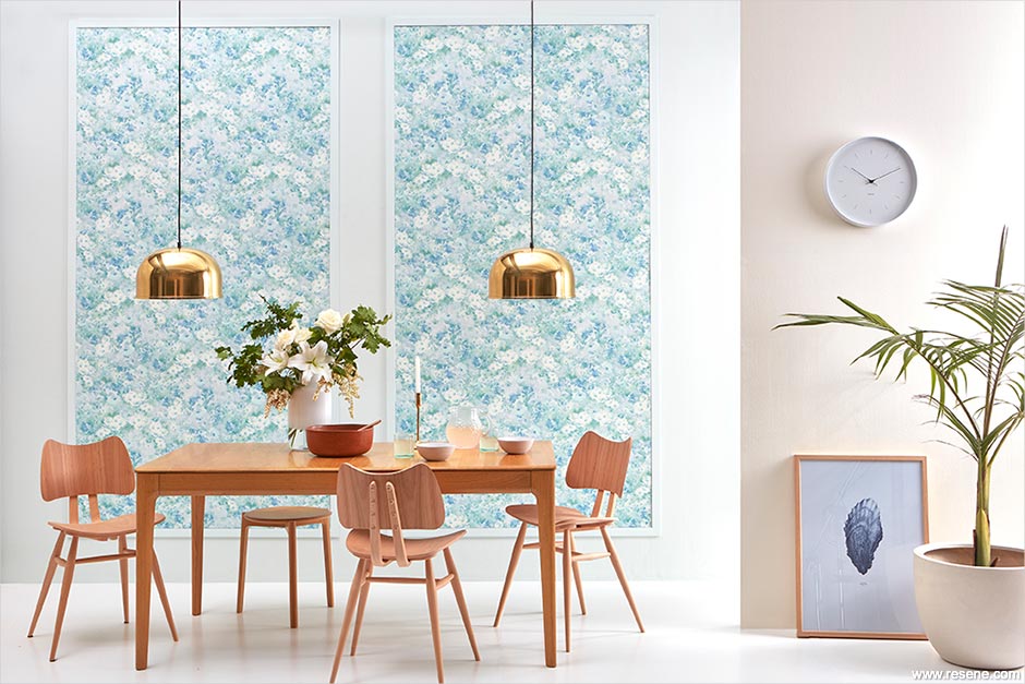 Dining room with blue wallpaper