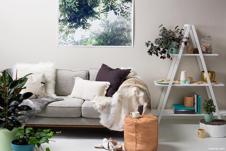 A neutral lounge accessorised with houseplants