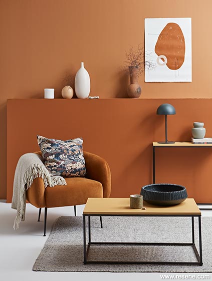 Terracotta walls and lounge chair