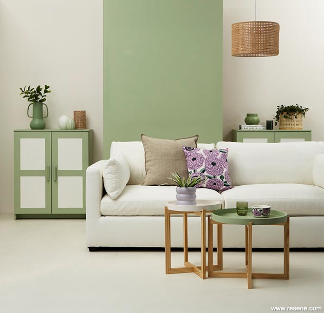 A green and beige living room