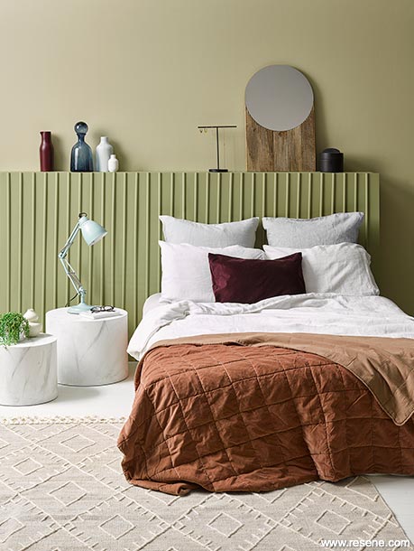 An earthy green bedroom