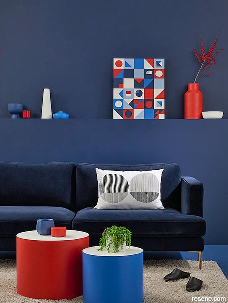Navy blue lounge with red accents
