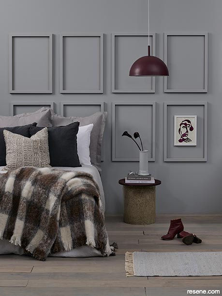 A grey bedroom with battens