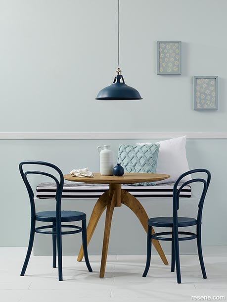 A blue French country style dining room