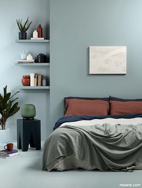 A green/blue gender neutral bedroom