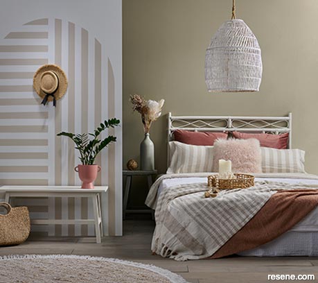A bedroom painted in earthy tones