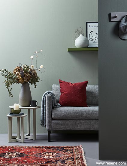 Schist green living - stylish greens and muted reds.