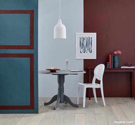 A dining room with burgundy and blue feature wall 2