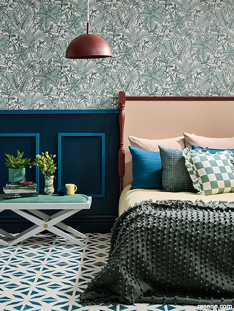 Textured green and blue bedroom with bold wallpaper
