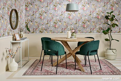 A dining room with a floral design theme