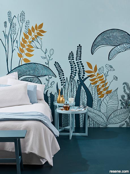 A blue and gold whimsical bedroom
