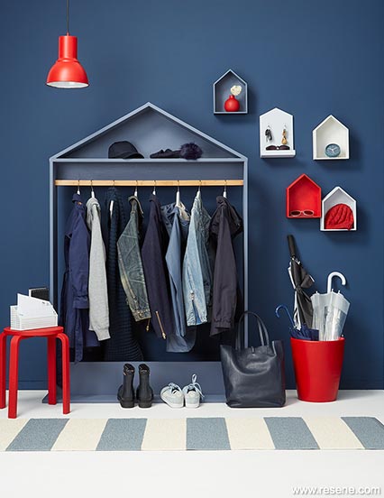 A classic navy blue mudroom