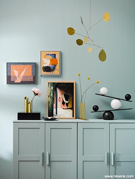 Paint your walls and storage cabinets in the same colour