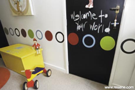 A nursery with colourful painted dots