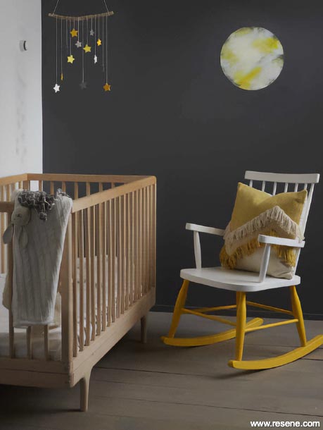 Nursery with rocking chair and star mobile