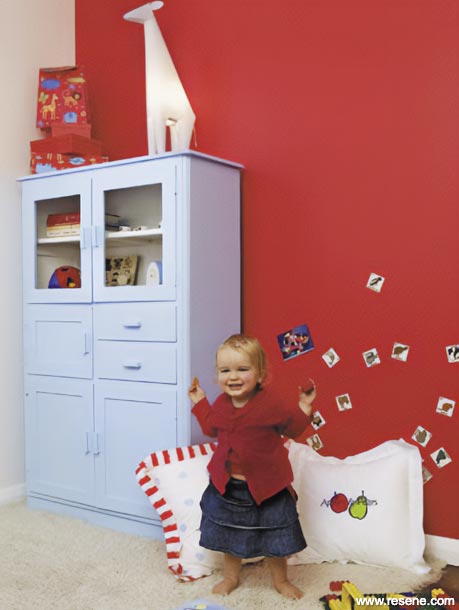 A red and blue nursery design