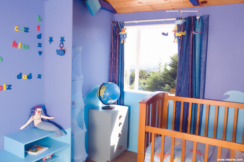 A blue and purple sea themed bedroom