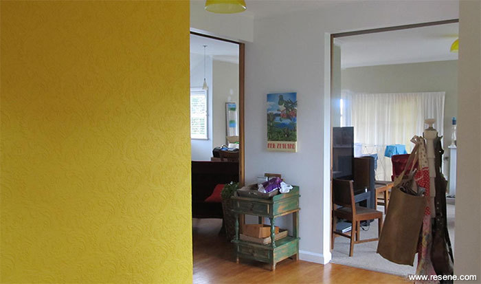 Feature wall painted with a bold yellow