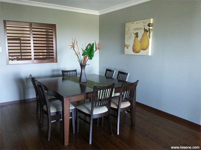 The dining room has been painted in Resene Lemon Grass, skirting boards in Resene Cioccolato