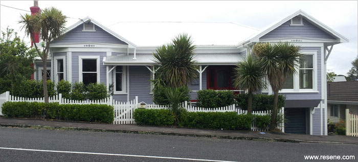 Resene Santas Grey on the weatherboards with Resene White windows and trim