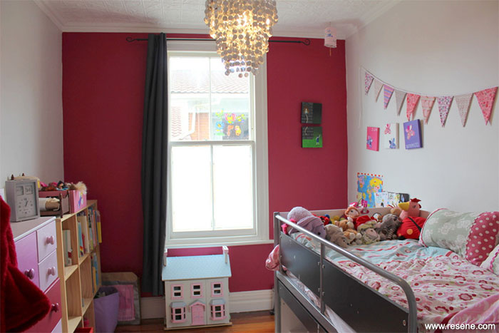 Child's room with Resene Tickled Pink feature wall