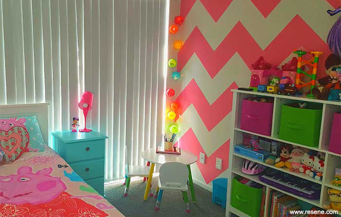 A Resene Deep Blush chevron pattern for her daughter's bedroom wall