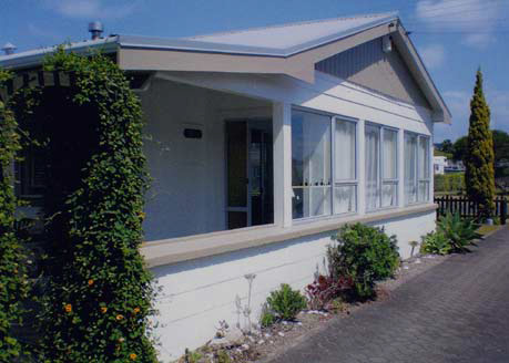  The windowsills, triangular feature boards and garage doors was changed to Resene Arrowtown
