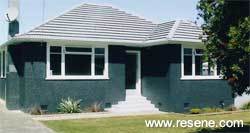 Resene Ebony Clay on the walls complemented by Resene Jumbo on the front steps, door and backdoor