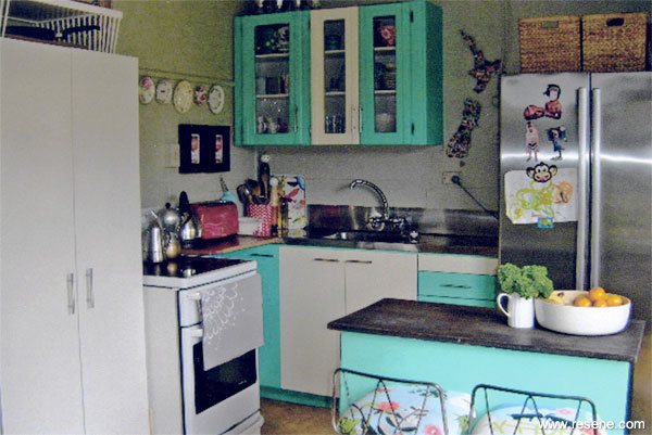 A 50s themed green and cream kitchen