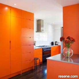 An attention-grabbing orange kitchen