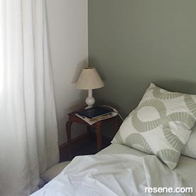 Green and white bedroom