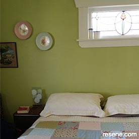 Green and white master bedroom
