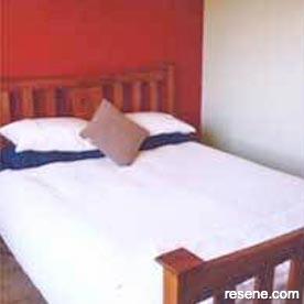Red and beige bedroom 