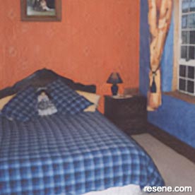 Orange, blue, and white bedroom