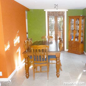 Green and orange dining room